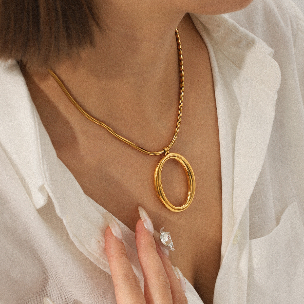 Personalized Light Luxury Snake Bone Chain Hollow Oval Pendant Stainless Steel Necklace Simple and High-end Collar Chain Necklace
