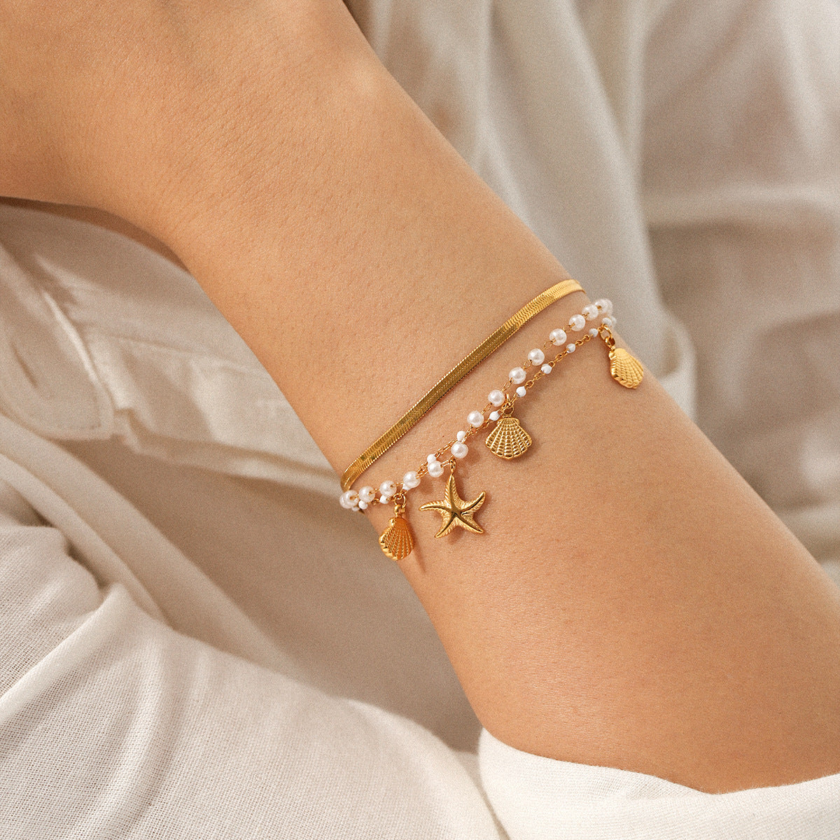 Marine-themed Stainless Steel Bracelet Set for Women , Including Jewelry Such As Seashell and Starfish Pendants, Pearl Chains, and Snake Bone Chains 3 Pcs