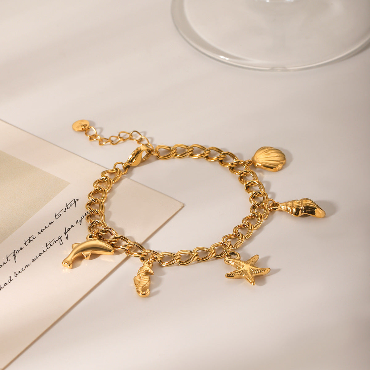 Marine Stainless Steel Bracelet with Dolphin, Seahorse, Starfish, Conch Shell, and Shellfish Pendants - Non-fading Jewelry