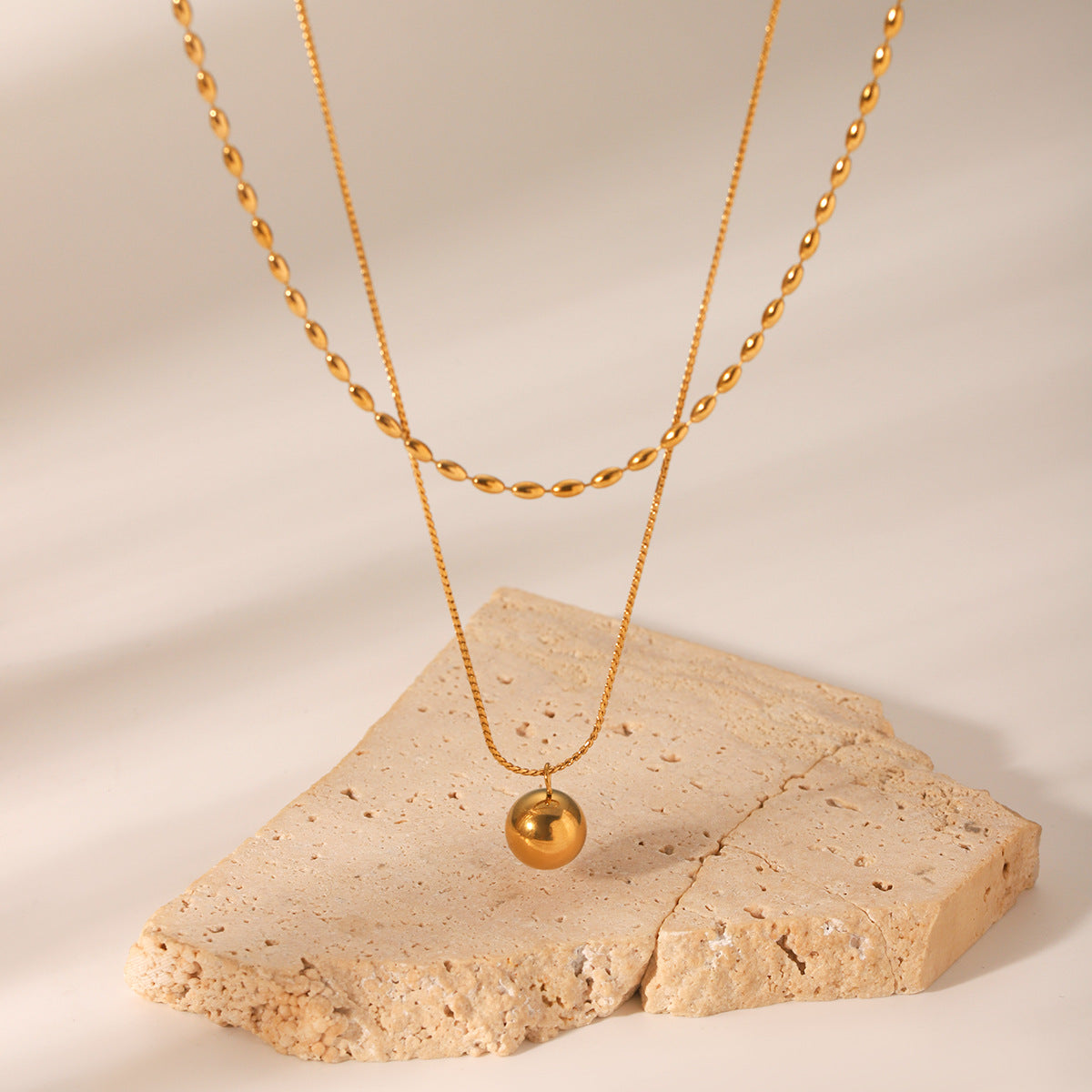 Double-layer stainless steel necklace, oval bead chain, Fried Dough Twists chain, small golden ball pendant, neck chain, titanium steel necklace accessory, does not fade