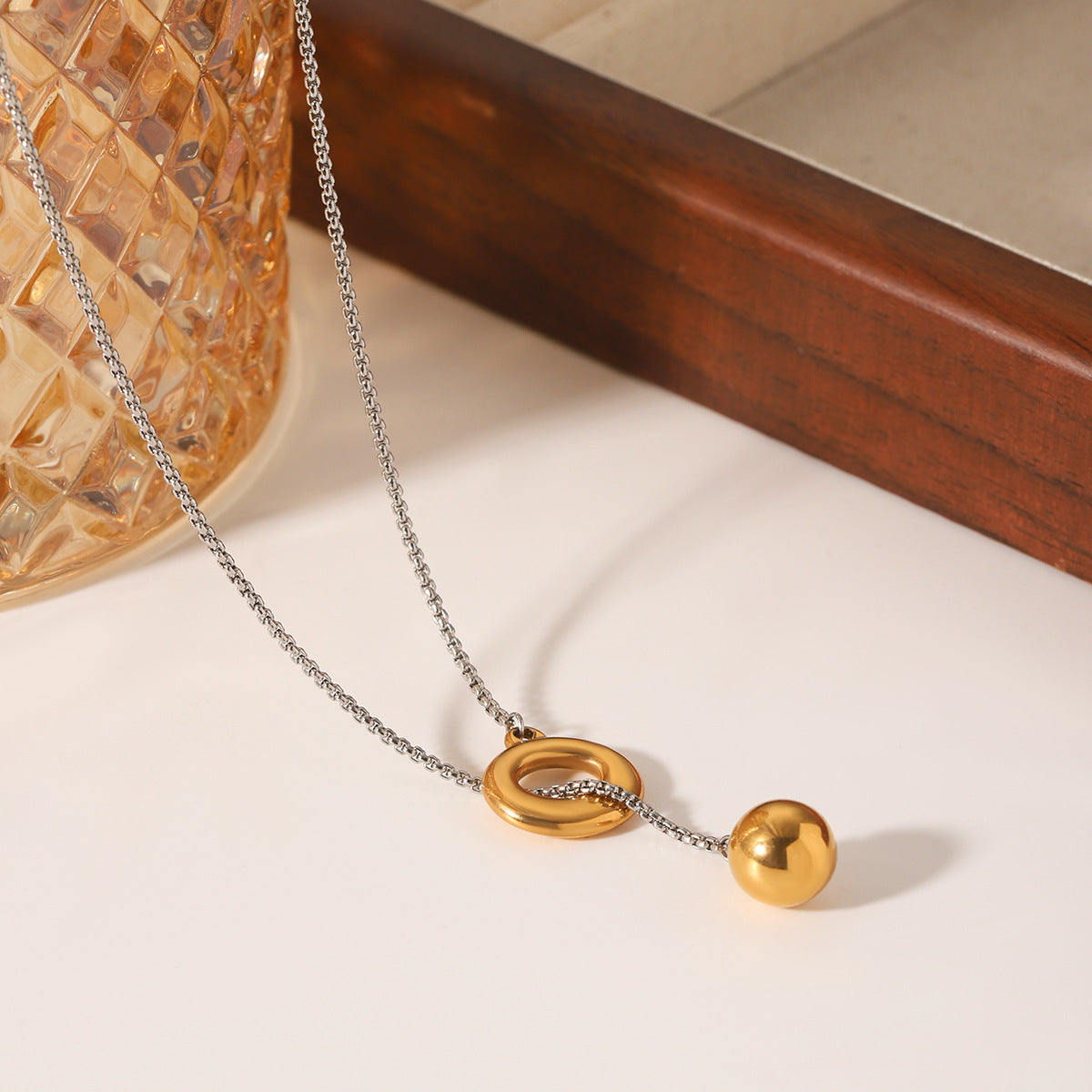 Gold and Silver Color-blocked Stainless Steel Ring Buckle Spherical Pendant Necklace for Women, Niche Design, Titanium Steel Sweater Chain Necklace Accessory