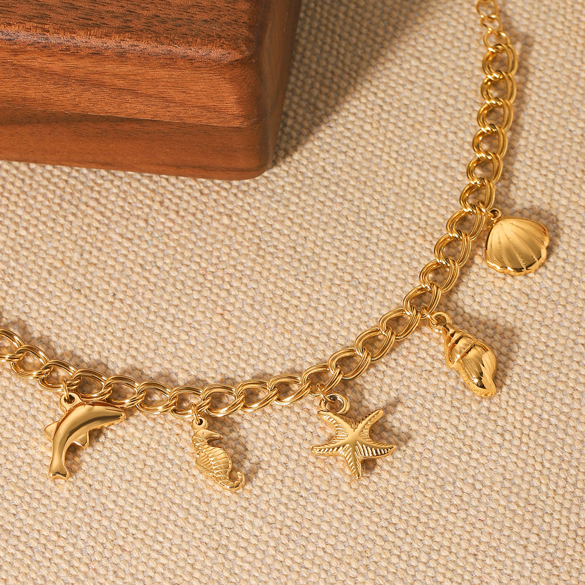 Marine Stainless Steel Bracelet with Dolphin, Seahorse, Starfish, Conch Shell, and Shellfish Pendants - Non-fading Jewelry
