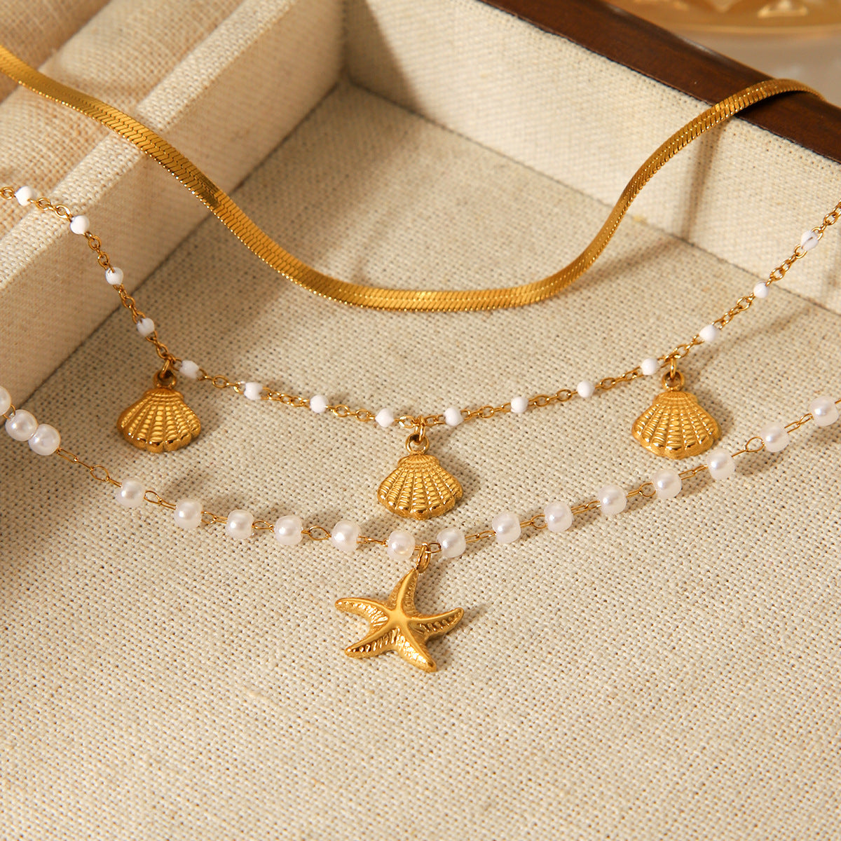 Marine-themed Stainless Steel Bracelet Set for Women , Including Jewelry Such As Seashell and Starfish Pendants, Pearl Chains, and Snake Bone Chains 3 Pcs