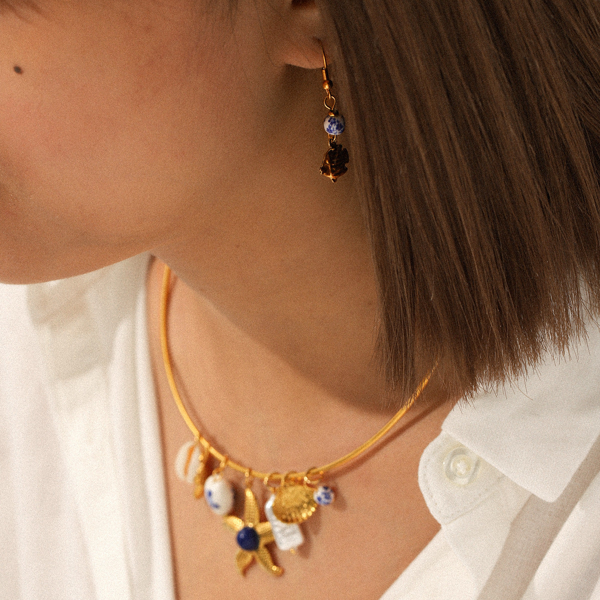 Ocean-inspired Resort Style Stainless Steel Necklace with Ceramic Heart Pendant and Titanium Steel Chain, Offering A Touch of Luxury with A Niche Appeal