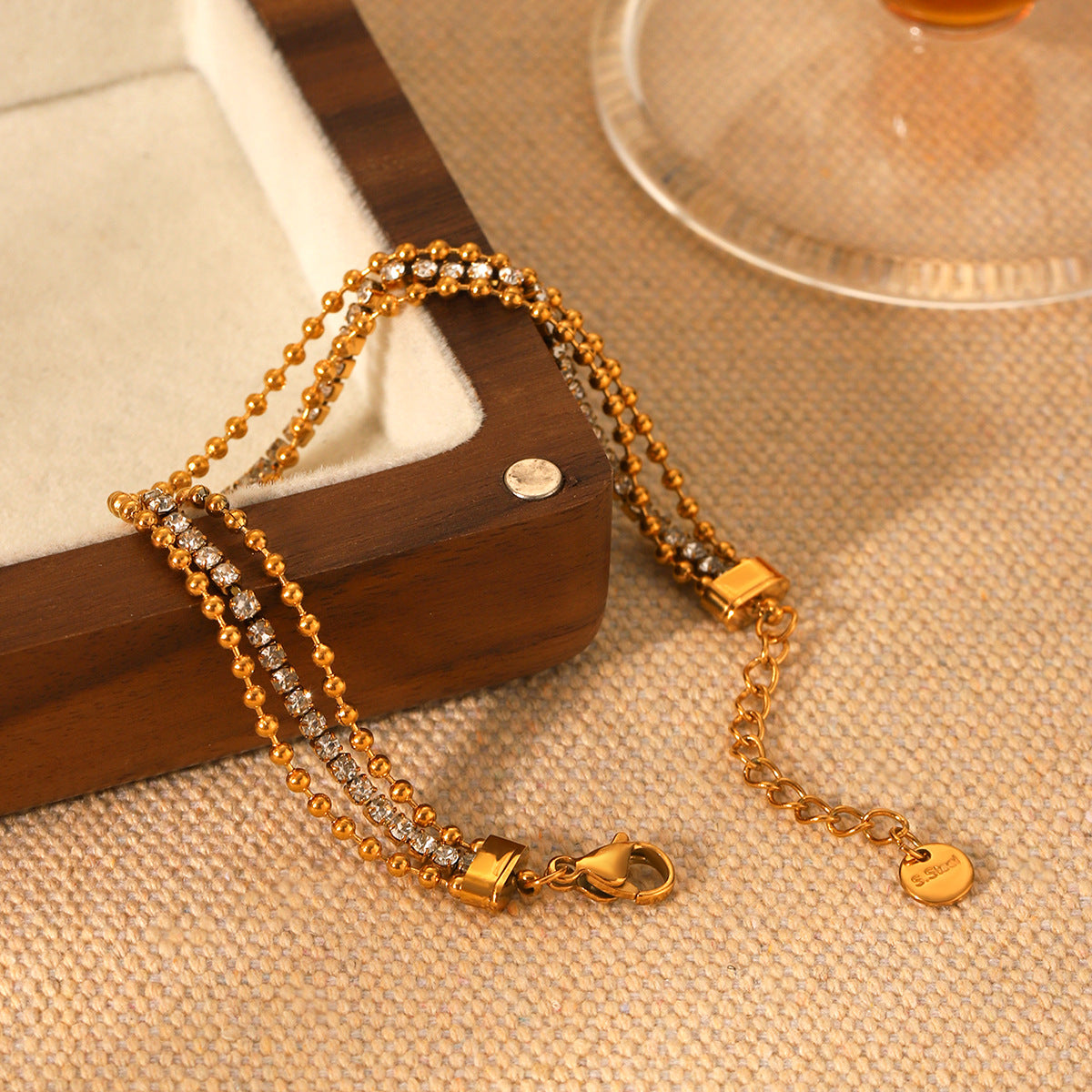 Multi-layer stainless steel bracelet bead chain splicing zircon chain niche design titanium steel non-fading jewelry