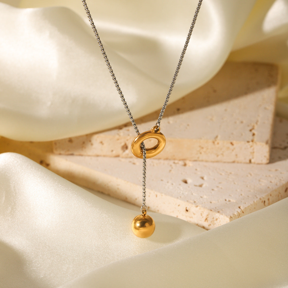Gold and Silver Color-blocked Stainless Steel Ring Buckle Spherical Pendant Necklace for Women, Niche Design, Titanium Steel Sweater Chain Necklace Accessory