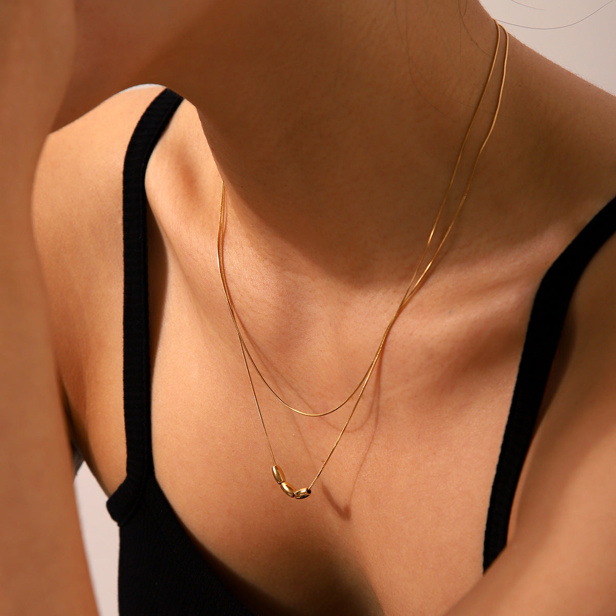 Simple 18k gold double-layer stackable necklace for women, stainless steel, cool style, beaded snake bone chain, does not fade